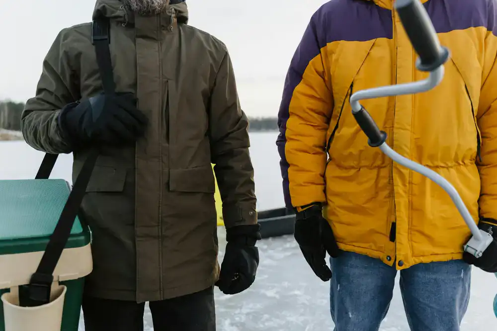 Guests preparing for a morning activity by the frozen lake