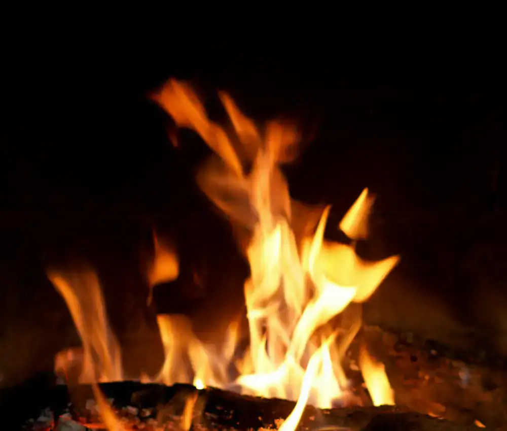 Cosy roaring fireplace inside the main lodge area